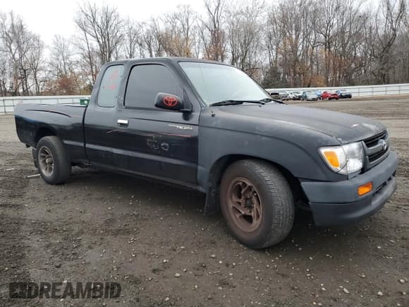 ✅ 1997 Toyota Tacoma • VIN: 4TAVL52N5VZ283416 • Lot: 93865885. Listed on Copart with 227,124 mi. Free auction sales archive from the USA and detailed vehicle history report at DreamBid. Image 4.