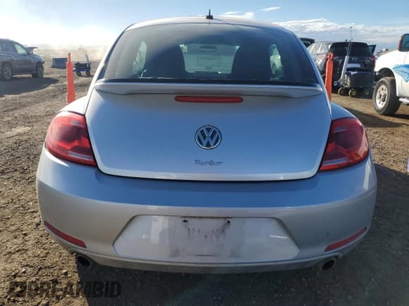 ✅ 2012 Volkswagen Beetle Turbo • VIN: 3VWVA7AT1CM617457 • Lot: 82267255. Wystawiony na Copart z przebiegiem 155 222 mil. Bezpłatny archiwum sprzedaży aukcyjnych z USA i szczegółowy raport historii pojazdu na DreamBid. Zdjęcie 6.