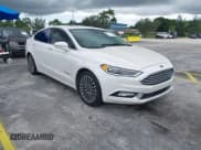 ✅ 2017 Ford Fusion Hybrid Titanium • VIN: 3FA6P0RU4HR250242 • Лот: 43224550. Опубликован ранее на IAAI с пробегом 178 522 миль. Бесплатный доступ к архиву аукционных продаж из США и подробный отчёт об истории автомобиля на DreamBid. Изображение 1.