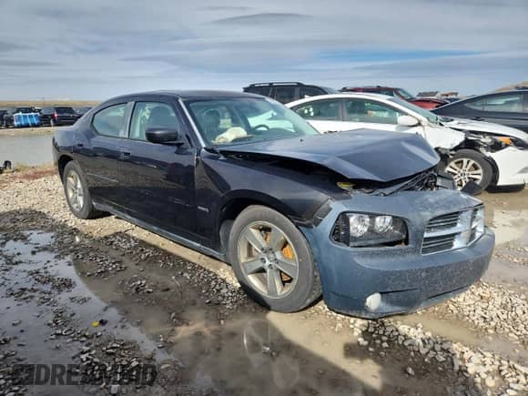 2009 Dodge Charger R/T z VIN 2B3KA53T59H582101, wystawiony jako Copart lot #82315735 z przebiegiem 181 305 mil mil oraz Szkoda całkowita • Salvage title. Historia ofert i sprzedaży dostępna na DreamBid. Obrazek 4.