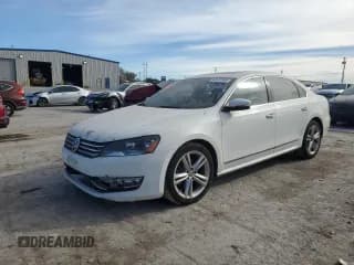 ✅ 2015 Volkswagen Passat SE • VIN: 1VWBT7A30FC056994 • Lot: 93432595. Listed on Copart with 106,997 mi. Free auction sales archive from the USA and detailed vehicle history report at DreamBid. Image 1.