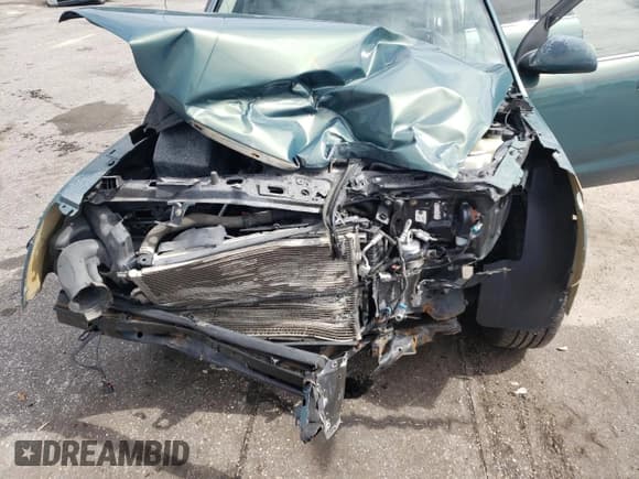 ✅ 2006 Saturn VUE • VIN: 5GZCZ63416S888757 • Lot: 67427625. Listed on Copart with 124,183 mi. Free auction sales archive from the USA and detailed vehicle history report at DreamBid. Image 12.