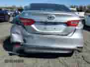 2019 Toyota Camry LE z VIN 4T1B11HKXKU821888, wystawiony jako Copart lot #86159375 z przebiegiem 64 469 mil mil oraz Szkoda całkowita • Salvage title. Historia ofert i sprzedaży dostępna na DreamBid. Obrazek 6.