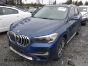 ✅ 2022 BMW X1 xDrive28i • VIN: WBXJG9C09N5V21019 • Lot: 41582490. Listed on IAAI with 21,514 mi. Free auction sales archive from the USA and detailed vehicle history report at DreamBid. Image 2.