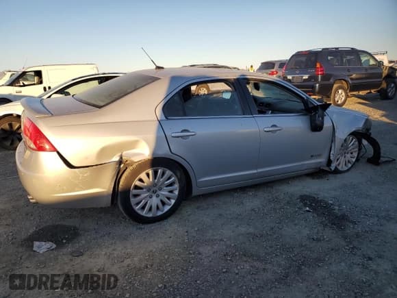 ✅ 2010 Mercury Milan Hybrid • VIN: 3MEDM0L32AR613281 • Lot: 87482914. Wystawiony na Copart z przebiegiem 143 812 mil. Bezpłatny archiwum sprzedaży aukcyjnych z USA i szczegółowy raport historii pojazdu na DreamBid. Zdjęcie 3.