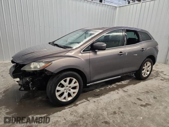 ✅ 2009 Mazda CX-7 Sport • VIN: JM3ER293790237898 • Лот: 90686495. Опубликован ранее на Copart с пробегом 188 058 миль. Бесплатный доступ к архиву аукционных продаж из США и подробный отчёт об истории автомобиля на DreamBid. Изображение 1.