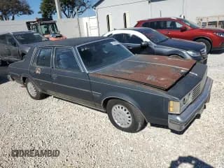 ✅ 1987 Oldsmobile Cutlass • VIN: 2G3GR51A3H2317919 • Lot: 41343945. Listed on Copart with 5,831 mi. Free auction sales archive from the USA and detailed vehicle history report at DreamBid. Image 4.