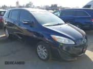 ✅ 2015 Mazda 5 Sport • VIN: JM1CW2BL7F0182965 • Lot: 43606712. Listed on IAAI with 150,777 mi. Free auction sales archive from the USA and detailed vehicle history report at DreamBid. Image 1.