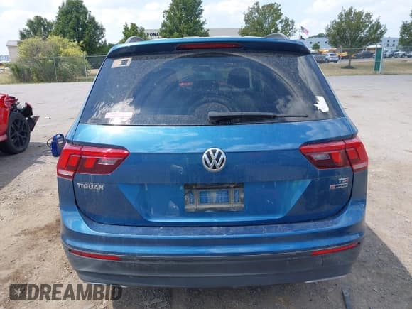 ✅ 2018 Volkswagen Tiguan S • VIN: 3VV0B7AX4JM087786 • Lot: 42941983. Listed on IAAI with 87,202 mi. Free auction sales archive from the USA and detailed vehicle history report at DreamBid. Image 16.