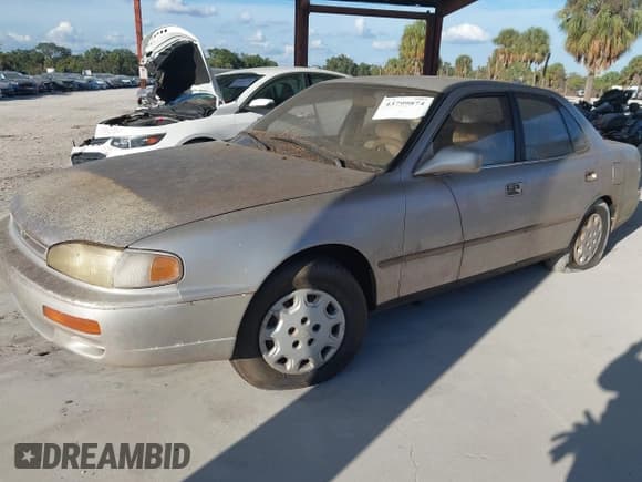 ✅ 1995 Toyota Camry LE • VIN: JT2SK12E7S0273689 • Лот: 43799874. Опубликован ранее на IAAI с пробегом 154 750 миль. Бесплатный доступ к архиву аукционных продаж из США и подробный отчёт об истории автомобиля на DreamBid. Изображение 2.