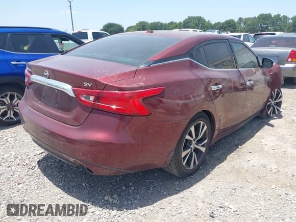 ✅ 2016 Nissan Maxima Platinum • VIN: 1N4AA6AP9GC401707 • Lot: 42760679. Listed on IAAI with 161,662 mi. Free auction sales archive from the USA and detailed vehicle history report at DreamBid. Image 4.