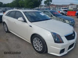 ✅ 2014 Cadillac CTS • VIN: 1G6DF8E56E0185166 • Lot: 42826722. Listed on IAAI with 154,595 mi. Free auction sales archive from the USA and detailed vehicle history report at DreamBid. Image 1.