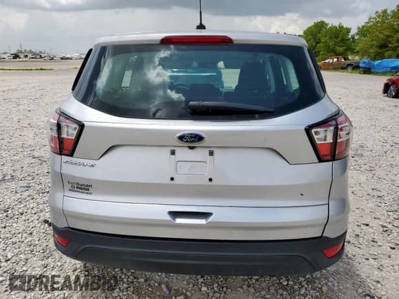 ✅ 2018 Ford Escape S • VIN: 1FMCU0F71JUA79111 • Lot: 62777645. Listed on Copart with 77,803 mi. Free auction sales archive from the USA and detailed vehicle history report at DreamBid. Image 6.