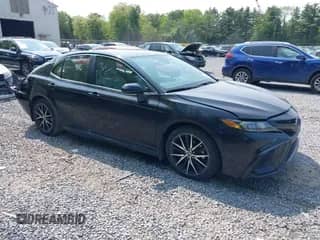 2023 Toyota Camry SE with VIN 4T1G11BKXPU101092, listed as a IAAI auction lot 42396141 with 22,174 mi miles and . Bid and sale history available at DreamBid. Image 1.