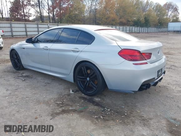 ✅ 2015 BMW 6 Series 650i • VIN: WBA6B2C5XFD799355 • Lot: 43664300. Listed on IAAI with 125,050 mi. Free auction sales archive from the USA and detailed vehicle history report at DreamBid. Image 3.
