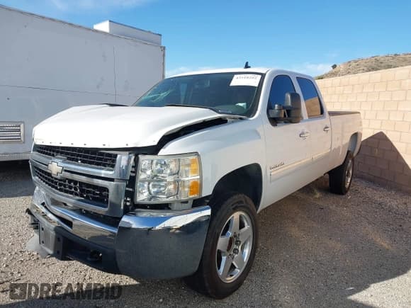 ✅ 2014 Chevrolet Silverado 2500HD LT • VIN: 1GC1CXCG5EF107871 • Lot: 43518202. Listed on IAAI with 74,569 mi. Free auction sales archive from the USA and detailed vehicle history report at DreamBid. Image 2.