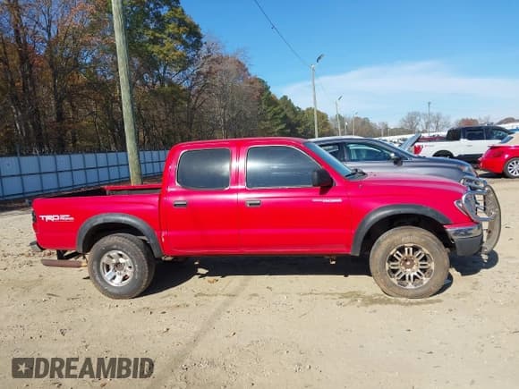 ✅ 2001 Toyota Tacoma PreRunner • VIN: 5TEGN92N21Z772434 • Lot: 43725357. Listed on IAAI with 344,649 mi. Free auction sales archive from the USA and detailed vehicle history report at DreamBid. Image 13.