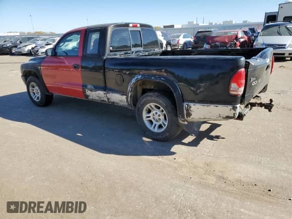 2003 Dodge Dakota SLT z VIN 1D7HL42X33S284170, wystawiony jako Copart lot #76657204 z przebiegiem 146 790 mil mil oraz Szkoda całkowita • Salvage title. Historia ofert i sprzedaży dostępna na DreamBid. Obrazek 2.