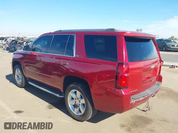 ✅ 2015 Chevrolet Tahoe LTZ • VIN: 1GNSCCKC2FR216758 • Lot: 43689893. Listed on IAAI with 184,851 mi. Free auction sales archive from the USA and detailed vehicle history report at DreamBid. Image 3.