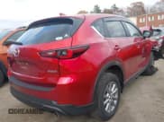 ✅ 2022 Mazda CX-5 S Preferred • VIN: JM3KFBCM5N0573346 • Lot: 43732540. Listed on IAAI with 48,112 mi. Free auction sales archive from the USA and detailed vehicle history report at DreamBid. Image 4.