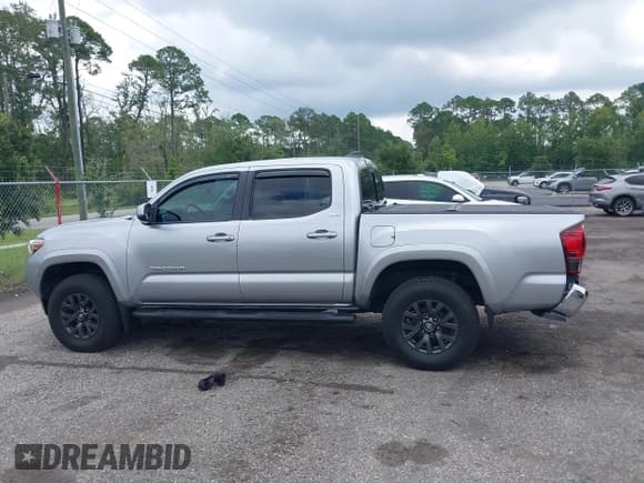 ✅ 2021 Toyota Tacoma SR5 • VIN: 3TYAZ5CN0MT003244 • Lot: 42942708. Listed on IAAI with 55,848 mi. Free auction sales archive from the USA and detailed vehicle history report at DreamBid. Image 14.