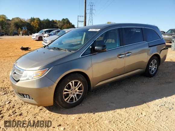✅ 2012 Honda Odyssey EX • VIN: 5FNRL5H47CB072757 • Лот: 91877955. Опубликован ранее на Copart с пробегом 190 185 миль. Бесплатный доступ к архиву аукционных продаж из США и подробный отчёт об истории автомобиля на DreamBid. Изображение 1.