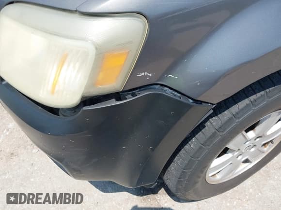 ✅ 2010 Mercury Mariner • VIN: 4M2CN8BG8AKJ19762 • Lot: 42466703. Listed on IAAI with 240,178 mi. Free auction sales archive from the USA and detailed vehicle history report at DreamBid. Image 13.