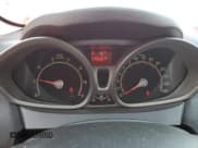 ✅ 2012 Ford Fiesta SE • VIN: 3FADP4EJ9CM158687 • Лот: 92367005. Опубликован ранее на Copart с пробегом 79 693 миль. Бесплатный доступ к архиву аукционных продаж из США и подробный отчёт об истории автомобиля на DreamBid. Изображение 9.