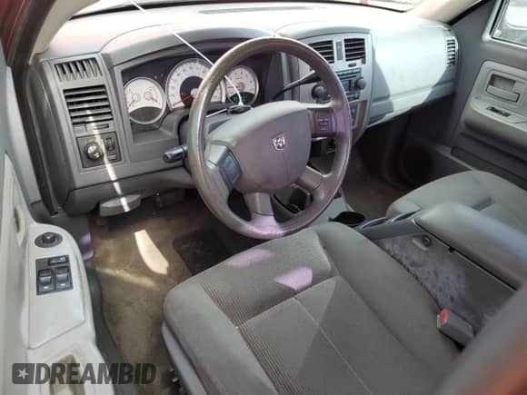 2006 Dodge Dakota SLT с VIN 1D7HW42N46S517113, выставлен на аукционе Copart как лот 79292764 с пробегом 210 005 миль миль и Списание • Salvage title. История ставок и продаж доступна на DreamBid. Изображение 8.