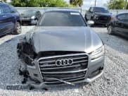 ✅ 2016 Audi A8 Sport • VIN: WAU43AFD8GN008513 • Lot: 68793975. Listed on Copart with 76,071 mi. Free auction sales archive from the USA and detailed vehicle history report at DreamBid. Image 5.