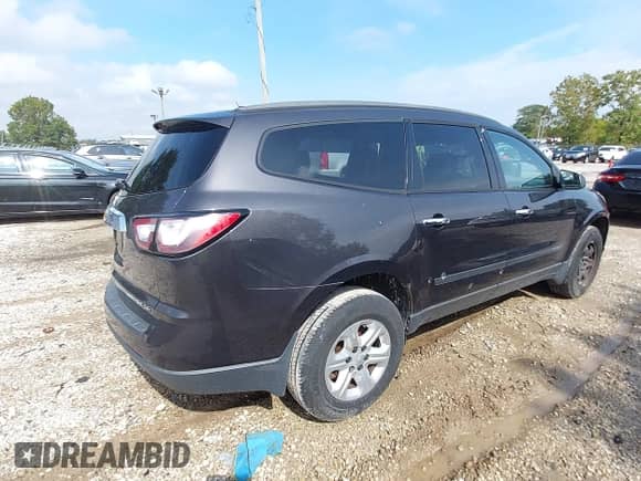 2013 Chevrolet Traverse LS with VIN 1GNKRFED9DJ142240, listed as a IAAI auction lot 43289842 with 152,647 mi miles and . Bid and sale history available at DreamBid. Image 4.