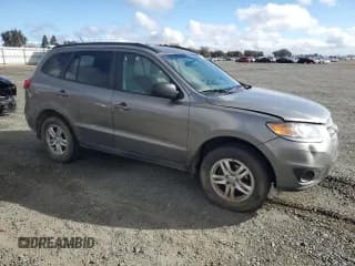 ✅ 2012 Hyundai Santa Fe GLS • VIN: 5XYZGDAB7CG164774 • Lot: 78517034. Listed on Copart with 267,198 mi. Free auction sales archive from the USA and detailed vehicle history report at DreamBid. Image 4.