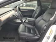 ✅ 2022 Tesla Model 3 • VIN: 5YJ3E1EA5NF201715 • Lot: 50732595. Listed on Copart with 116,913 mi. Free auction sales archive from the USA and detailed vehicle history report at DreamBid. Image 7.