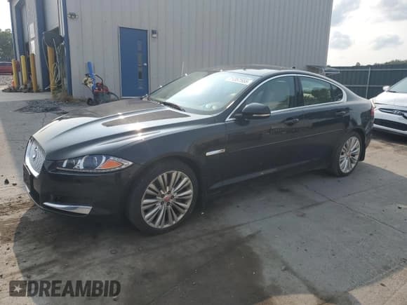 ✅ 2014 Jaguar XF SC • VIN: SAJWJ0EF9E8U18779 • Lot: 71357555. Listed on Copart with 72,071 mi. Free auction sales archive from the USA and detailed vehicle history report at DreamBid. Image 1.