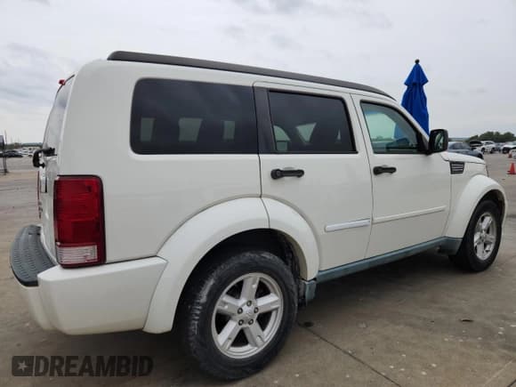 ✅ 2007 Dodge Nitro SLT • VIN: 1D8GT58K57W718953 • Lot: 90119395. Wystawiony na Copart z przebiegiem 163 241 mil. Bezpłatny archiwum sprzedaży aukcyjnych z USA i szczegółowy raport historii pojazdu na DreamBid. Zdjęcie 3.