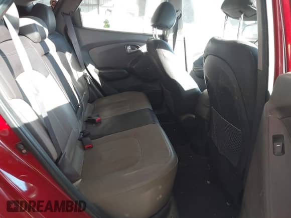 2010 Hyundai Tucson GLS with VIN KM8JUCAC8AU057801, listed as a IAAI auction lot 41037140 with 115,529 mi miles and . Bid and sale history available at DreamBid. Image 8.