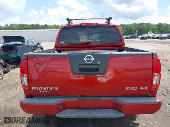 ✅ 2012 Nissan Frontier Pro-4X • VIN: 1N6AD0EV3CC439870 • Lot: 42269470. Listed on IAAI with 165,597 mi. Free auction sales archive from the USA and detailed vehicle history report at DreamBid. Image 16.