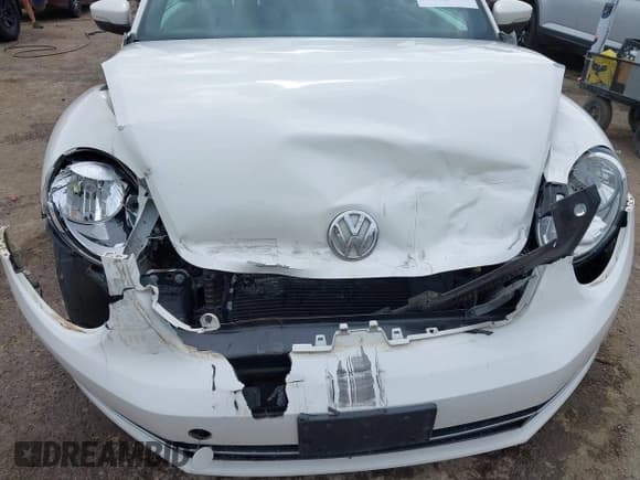 ✅ 2014 Volkswagen Beetle 2.0L TDI w/Sun/Sound/Nav • VIN: 3VWJL7AT1EM621584 • Лот: 42340715. Опубликован ранее на IAAI с пробегом 92 443 миль. Бесплатный доступ к архиву аукционных продаж из США и подробный отчёт об истории автомобиля на DreamBid. Изображение 6.