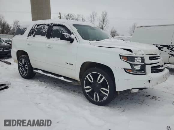 2020 Chevrolet Tahoe Premier with VIN 1GNSKCKJXLR182971, listed as a Copart auction lot 87268634 with 210,000 mi miles and Salvage title. Bid and sale history available at DreamBid. Image 4.
