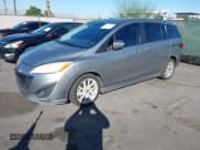 ✅ 2013 Mazda 5 Touring • VIN: JM1CW2CL2D0160965 • Lot: 43410114. Listed on IAAI with 107,043 mi. Free auction sales archive from the USA and detailed vehicle history report at DreamBid. Image 2.