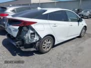 ✅ 2021 Toyota Prius LE • VIN: JTDKAMFP7M3183029 • Лот: 42422014. Опубликован ранее на IAAI с пробегом 58 121 миль. Бесплатный доступ к архиву аукционных продаж из США и подробный отчёт об истории автомобиля на DreamBid. Изображение 4.