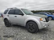 ✅ 2011 Ford Escape XLT • VIN: 1FMCU0DGXBKC42810 • Lot: 90256185. Listed on Copart with 188,023 mi. Free auction sales archive from the USA and detailed vehicle history report at DreamBid. Image 4.