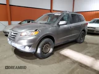 ✅ 2012 Hyundai Santa Fe GLS • VIN: 5XYZGDAB2CG164617 • Lot: 84761684. Listed on Copart with 226,387 mi. Free auction sales archive from the USA and detailed vehicle history report at DreamBid. Image 1.