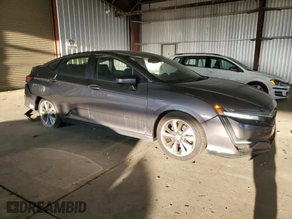 ✅ 2018 Honda Clarity • VIN: JHMZC5F17JC023852 • Lot: 70135235. Listed on Copart with 188,328 mi. Free auction sales archive from the USA and detailed vehicle history report at DreamBid. Image 4.
