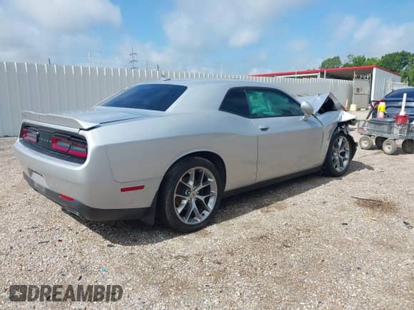 2020 Dodge Challenger SXT with VIN 2C3CDZAG4LH199088, listed as a IAAI auction lot 42337566 with 101,343 mi miles and . Bid and sale history available at DreamBid. Image 4.