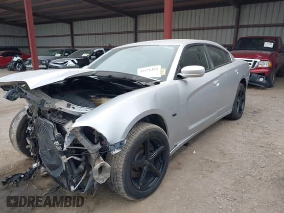 ✅ 2012 Dodge Charger Police • VIN: 2C3CDXAT1CH305496 • Lot: 43428332. Listed on IAAI with 249,533 mi. Free auction sales archive from the USA and detailed vehicle history report at DreamBid. Image 18.