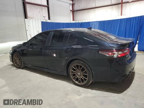 2023 Toyota Camry SE with VIN 4T1T11BK0PU075133, listed as a Copart auction lot 54743825 with 63,133 mi miles and Salvage title. Bid and sale history available at DreamBid. Image 2.