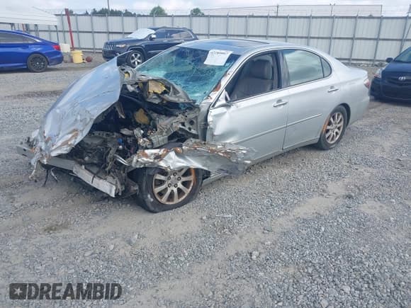 ✅ 2002 Lexus ES 300 • VIN: JTHBF30G220025571 • Lot: 42289997. Listed on IAAI with 87,554 mi. Free auction sales archive from the USA and detailed vehicle history report at DreamBid. Image 18.