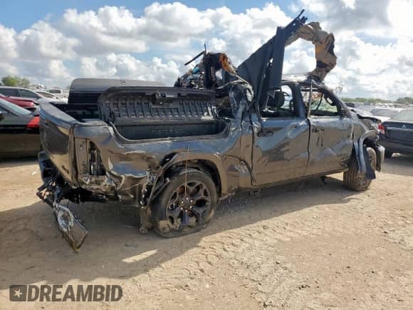 2024 Ram 1500 Limited with VIN 1C6SRFHT7RN213471, listed as a Copart auction lot 61980975 with Not provided miles and Non repairable. Bid and sale history available at DreamBid. Image 3.