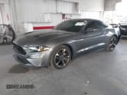 ✅ 2021 Ford Mustang EcoBoost • VIN: 1FA6P8TH4M5114569 • Lot: 43376525. Listed on IAAI with 22,091 mi. Free auction sales archive from the USA and detailed vehicle history report at DreamBid. Image 2.